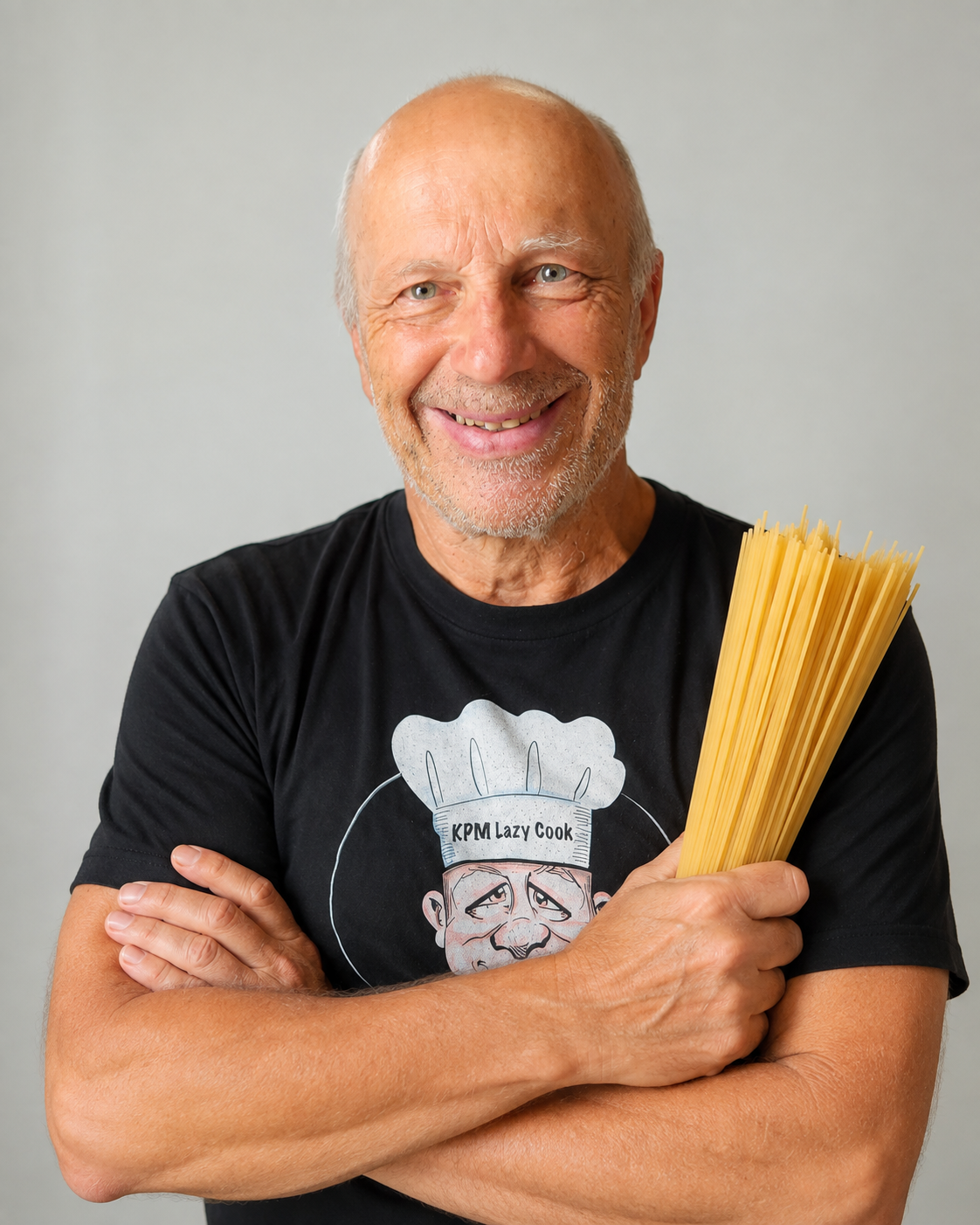 Curzio Caravati holding a bundle of pasta